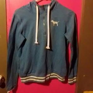 A blue Victoria's secret pink sweater